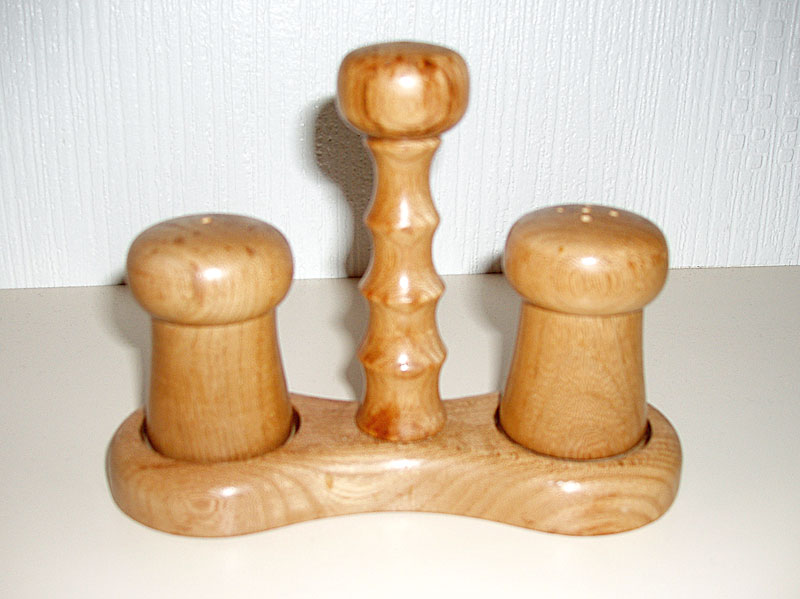 Salt & Pepper pots in stand